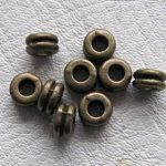 Antiikpronks metallhelmes 6x3 mm 1 tk