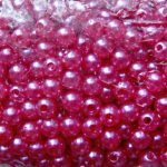 Tumeroosad plastikpärlid 6 mm, 10 tk